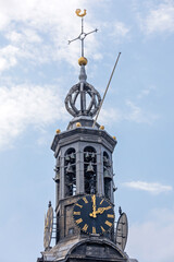 Fototapeta na wymiar Black Clock Tower Amsterdam