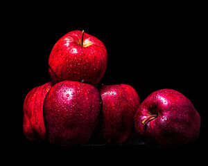 red apples on black