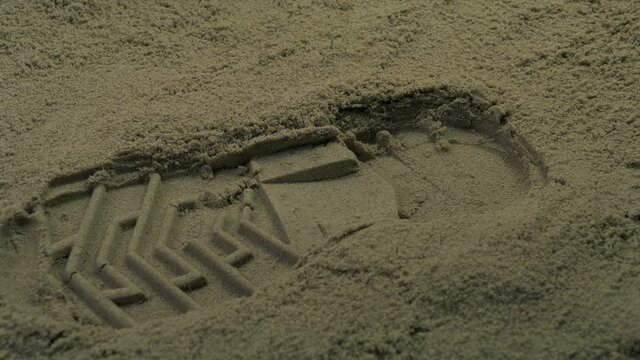 Shoe Print In The Sand
