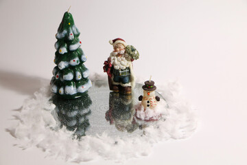 Fototapeta na wymiar Santa Claus, snowman as a decoration for a Christmas card.