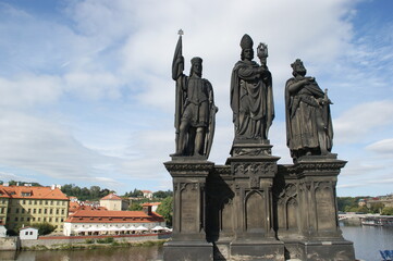 Fototapeta na wymiar One of the statues of the famous Charles Bridge in Prague