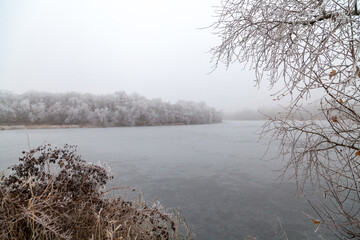 Panorama of  wide river on winter day
