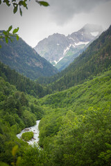 Fototapeta na wymiar Beautiful mountain landscape with river at Caucasus mountains.