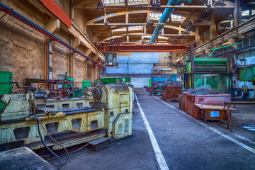 Factory with old industrial machinery. Horizontal view