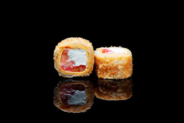 Breaded sushi with delicious sauce. Photos for the restaurant menu.