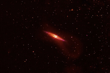 Red galaxy in deep space. Elements of this image were furnished by NASA.