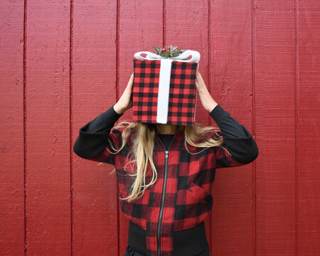 Funny Child Holding Present on Head
