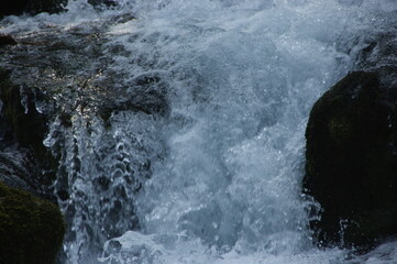 water flowing over rocks