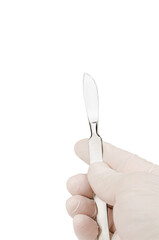 scalpel in man's hand in glove isolated on a white background