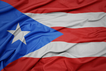 waving colorful national flag of puerto rico.