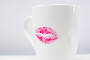 Ceramic coffee cup with rose lipstick