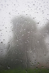 Rain on a window on a stormy day on the French Riviera in October