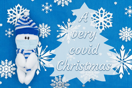 A Very Covid Christmas Message With A Snowman Wearing A Mask