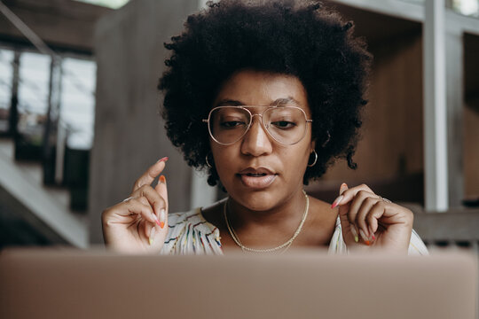 African American freelancer thinking over project