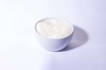 Obraz na płótnie Canvas Mayonnaise swirl in white bowl. 