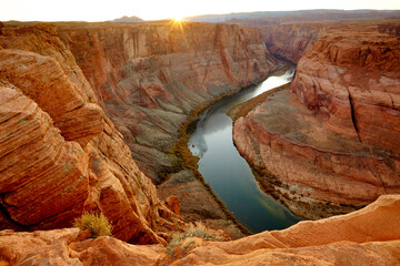 River winding through majestic rock formations in desert landscape, Page, Arizona, United States