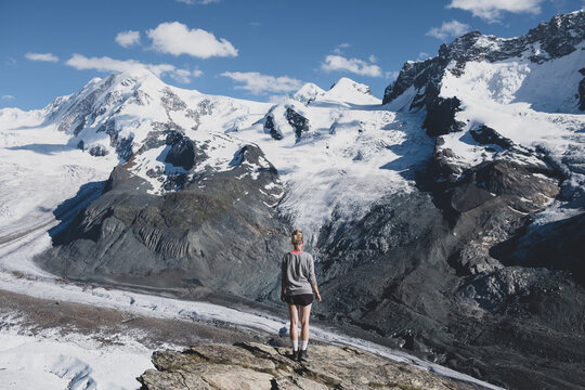 Traveler overlooking the glacier