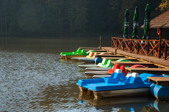 Colorful docked pedal boats on a lake near castle Trakoscan, Croatia