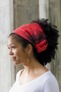 Mixed race woman in traditional headscarf