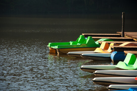 Colorful docked pedal boats on a lake near castle Trakoscan, Croatia