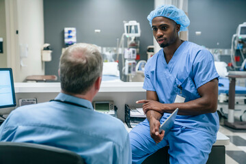 Doctor and nurse talking