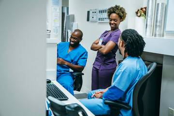 Nurses laughing in hospital