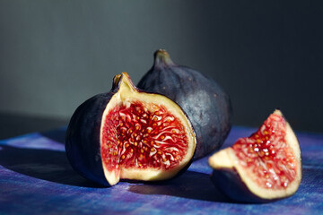 blue ripe figs in cut side view