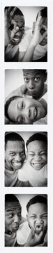 Father and son smiling in photo booth picture