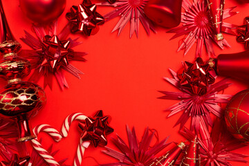 Red New Year and Christmas background. Decor, toys, decorations, balls.