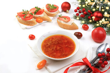 Traditional Russian borscht with parsley and bread on the festive table, business card for the menu, natural products and ingredients, healthy food concept, rustic style, selective approach.