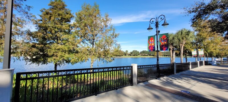 Altamonte Uptown Walkway with Parapet next to Lake in Cranes Roost Park. Photo image