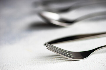 Cutlery set on concrete background