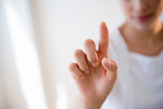 Close up of Hispanic woman pointing