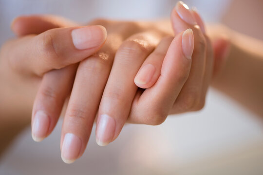 Close up of hands of Hispanic woman