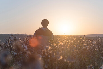 Mari man standing in field