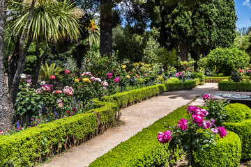 Beautiful garden in Granada Alhambra. Granada, Andalusia, Spain. - obrazy, fototapety, plakaty