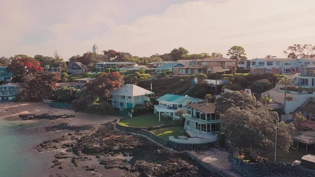 Aerial shot of Takapuna beach and waterfront homes, Auckland, New Zealand