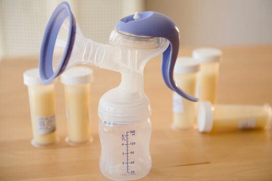 Breast pump and vials of breast milk