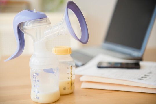 Breast pump and breast milk in bottle