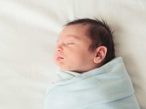 Portrait of newborn baby boy (0-1 months)