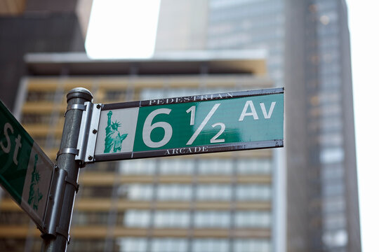 Low angle view of street name sign