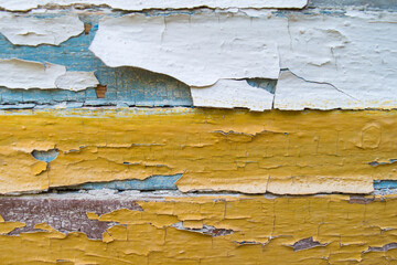 Background from old cracked paint. Chapped layers of old paint.