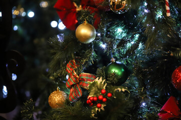 Obraz na płótnie Canvas Decorated Christmas tree on blurred background.