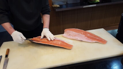 slicing a salmon