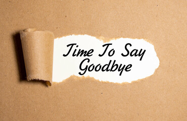 Time to say goodbye text on brown envelope