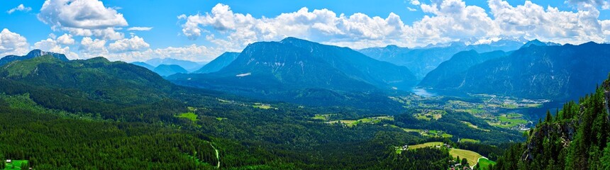 Fototapeta na wymiar A Big panoramic photo of the Austrian alps. Salzkammergut region. View from Predigtstuhl. 