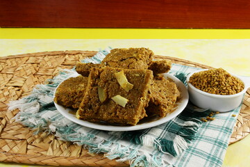 indian gujarati traditional healthy sweet for winter immunity methi pak or methi ladoo made from butter,fenugreek,dry fruit and other spices