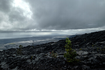 a rocky landscape with a cloudy sky