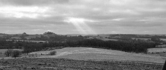 Abandoned stone and weathered wood farm building