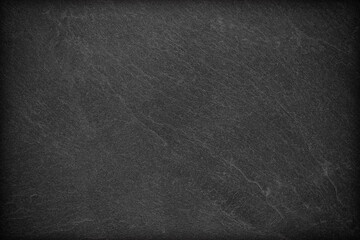 Dark grey black slate background or texture.